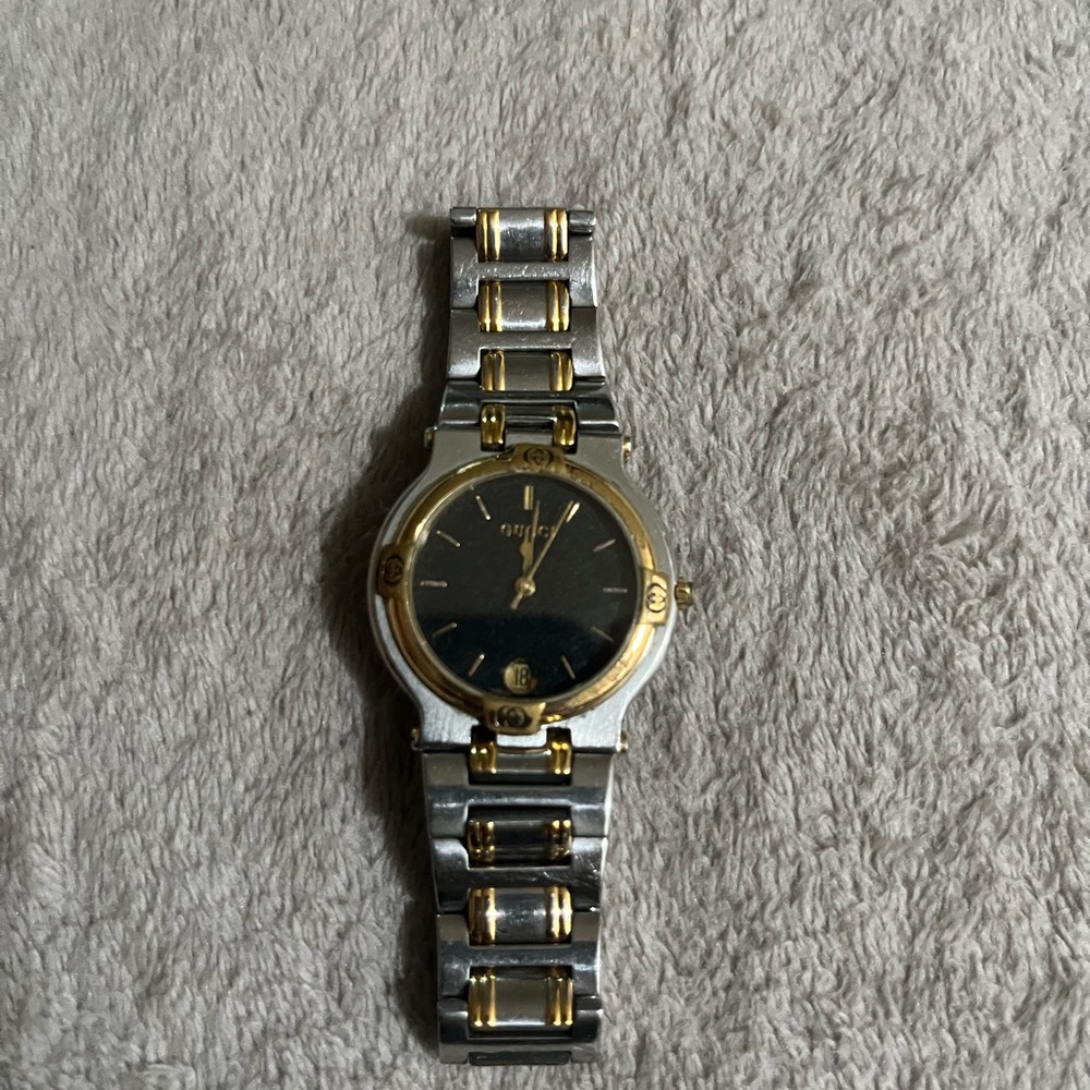 Gucci Women’s Silver and Gold Watch